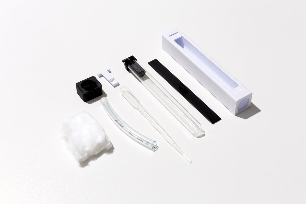 Contenu du Kit Start'Ant : feeder, tube, tuyau, outil de transfert et pipette